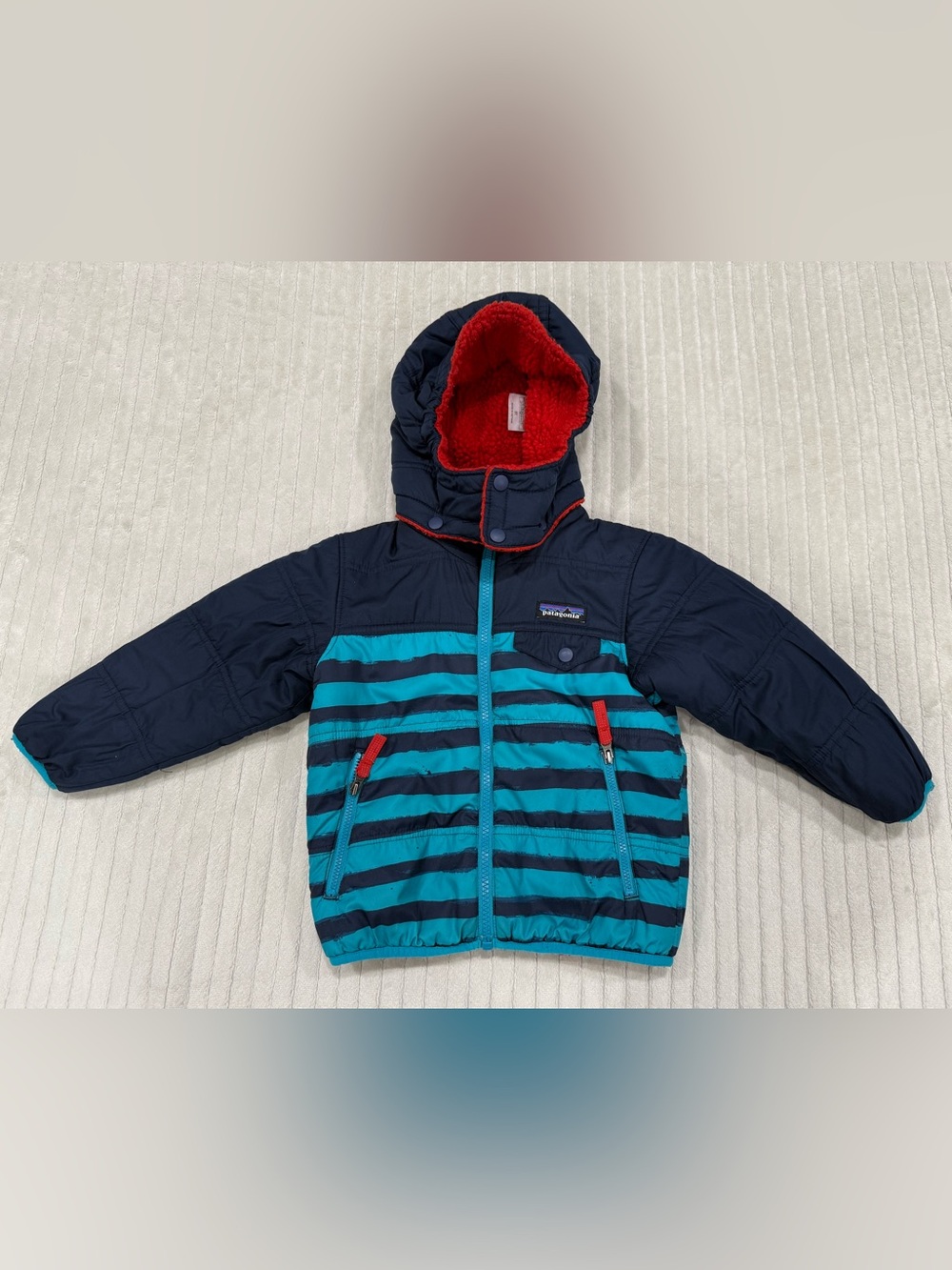 Patagonia Navy & Teal Striped Kids Puffer with Red Hood size 3T